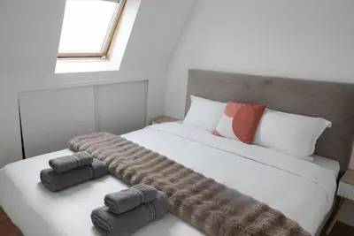 Un ou plusieurs lits dans un hébergement de l'établissement Skyline Parisian Flat - Exclusif Saint-Honoré