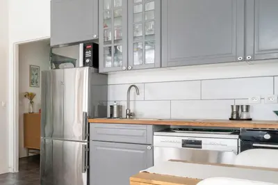 Cuisine ou kitchenette dans l'établissement Appartement L'Epique - Welkeys