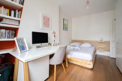 Télévision ou salle de divertissement dans l'établissement Appartement L'Epique - Welkeys
