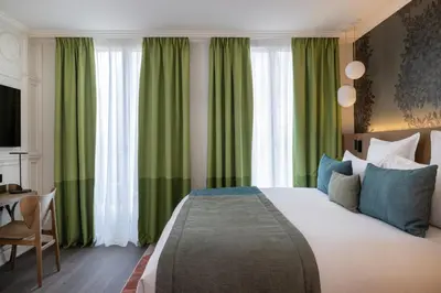 Un ou plusieurs lits dans un hébergement de l'établissement Hôtel L'Ormaie & Spa
