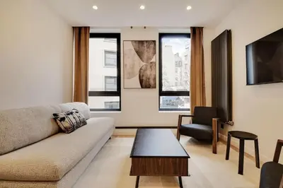 Coin salon dans l'établissement Appartement de Luxe 2BDR/7P - Louvre/tuileries