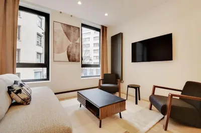 Télévision ou salle de divertissement dans l'établissement Appartement de Luxe 2BDR/7P - Louvre/tuileries