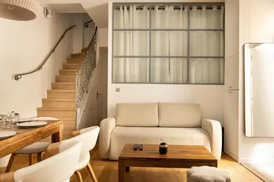Coin salon dans l'établissement Amazing apartment - 2BR-6P - Nation