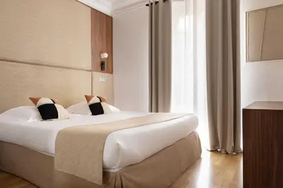 Un ou plusieurs lits dans un hébergement de l'établissement Amazing apartment - 2BR-6P - Nation