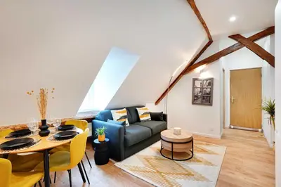 Coin salon dans l'établissement Charming apartment - 1BR-4P - Bastille