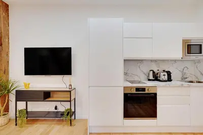 Cuisine ou kitchenette dans l'établissement Charming apartment - 1BR-4P - Bastille
