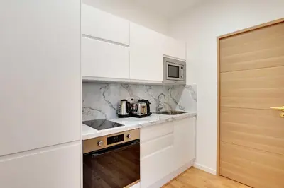 Cuisine ou kitchenette dans l'établissement Charming apartment - 1BR-4P - Bastille