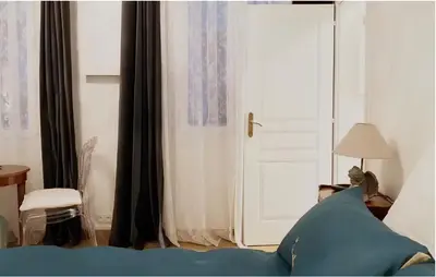 Un ou plusieurs lits dans un hébergement de l'établissement Seine Apartment