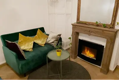 Coin salon dans l'établissement Seine Apartment