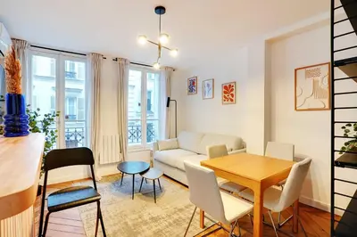 Coin salon dans l'établissement Charming Apartment - 1B-4P - Sacré Coeur