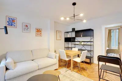 Coin salon dans l'établissement Charming Apartment - 1B-4P - Sacré Coeur