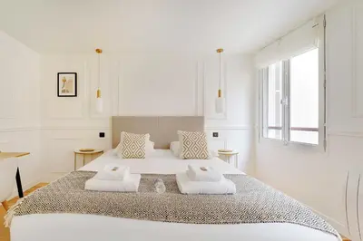 Un ou plusieurs lits dans un hébergement de l'établissement Cosy apartment - 1BR-2P - Gros-Caillou-Invalides