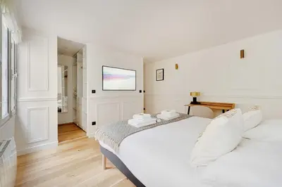 Un ou plusieurs lits dans un hébergement de l'établissement Cosy apartment - 1BR-2P - Gros-Caillou-Invalides
