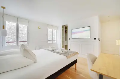 Un ou plusieurs lits dans un hébergement de l'établissement Cosy apartment - 1BR-2P - Gros-Caillou-Invalides