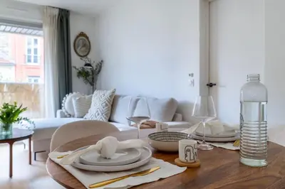 Coin salon dans l'établissement GASPAR - Joli nid douillet proche de Paris avec balcon