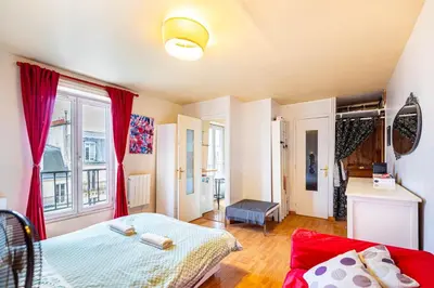 Un ou plusieurs lits dans un hébergement de l'établissement GuestReady - Cosy Haven near Montmartre