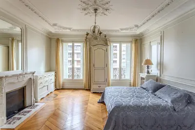 Un ou plusieurs lits dans un hébergement de l'établissement SACRE COEUR Grand Duplex 130 m2 - 4 chambres + double living