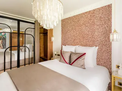 Un ou plusieurs lits dans un hébergement de l'établissement Merveil - Luxury Suite - Marais - Lenoir II