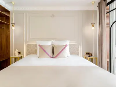 Un ou plusieurs lits dans un hébergement de l'établissement Merveil - Luxury Suite - Marais - Lenoir II
