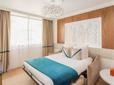 Un ou plusieurs lits dans un hébergement de l'établissement Merveil - Luxury Suite - Marais - Lenoir II