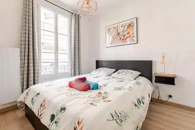 Un ou plusieurs lits dans un hébergement de l'établissement F2 au calme au cœur de Paris 13