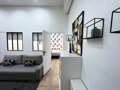 Coin salon dans l'établissement Urban Flat 66 - Pretty 3 bedroom in Paris