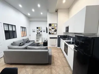 Coin salon dans l'établissement Urban Flat 66 - Pretty 3 bedroom in Paris