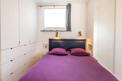 Un ou plusieurs lits dans un hébergement de l'établissement Luxury 1 BR apartment 700ft2 Montorgueil/LesHalles