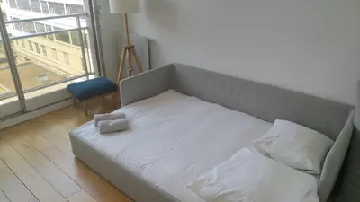 Un ou plusieurs lits dans un hébergement de l'établissement Grand Bright Apartment-4BDR-130m2