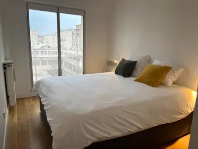 Un ou plusieurs lits dans un hébergement de l'établissement Grand Bright Apartment-4BDR-130m2
