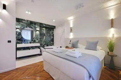 Un ou plusieurs lits dans un hébergement de l'établissement Charming apartment - 2BR-6P - Gare Saint-Lazare
