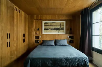 Un ou plusieurs lits dans un hébergement de l'établissement Duplex vue Tour Eiffel