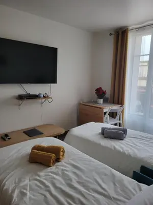 Un ou plusieurs lits dans un hébergement de l'établissement Amazing apartment a stone's throw from the City of Lights - Paris