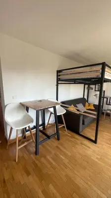 Un ou plusieurs lits dans un hébergement de l'établissement Beau studio spacieux et calme dans résidence de standing
