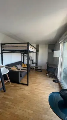 Un ou plusieurs lits dans un hébergement de l'établissement Beau studio spacieux et calme dans résidence de standing