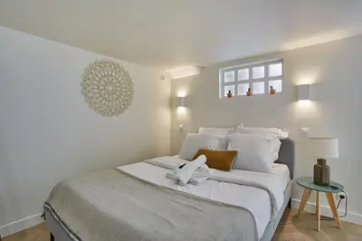 Un ou plusieurs lits dans un hébergement de l'établissement Apartment Saint Germain des prés by Studio prestige