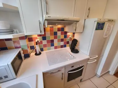 Cuisine ou kitchenette dans l'établissement Apartment 10 mn from Champs-Élysées PARIS
