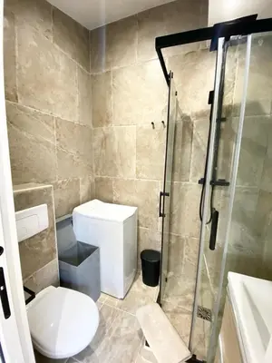 Salle de bains dans l'établissement Maisonnette Cosy au calme