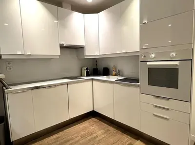 Cuisine ou kitchenette dans l'établissement GoodGuest-Cosy Apartment Paris Montorgueil-4 PAX Bail Mobilité