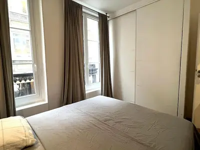 Un ou plusieurs lits dans un hébergement de l'établissement GoodGuest-Cosy Apartment Paris Montorgueil-4 PAX Bail Mobilité