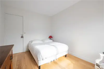 Un ou plusieurs lits dans un hébergement de l'établissement Veeve - Auteuil Adagio