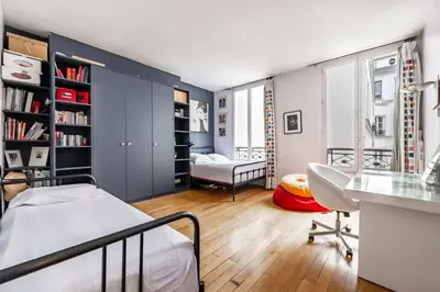 Un ou plusieurs lits dans un hébergement de l'établissement Veeve - Haut Marais Glam