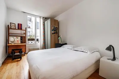 Un ou plusieurs lits dans un hébergement de l'établissement Veeve - Haut Marais Glam