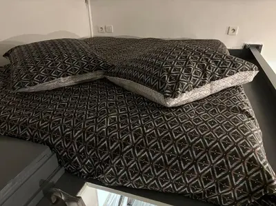 Un ou plusieurs lits dans un hébergement de l'établissement Studio Bastille