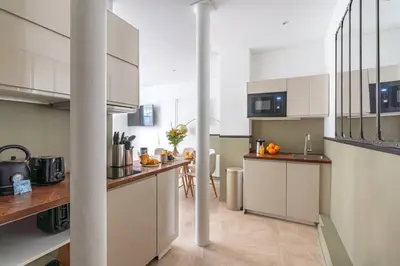 Cuisine ou kitchenette dans l'établissement NEW - Appartement Luxeux avec Cinema et Sauna