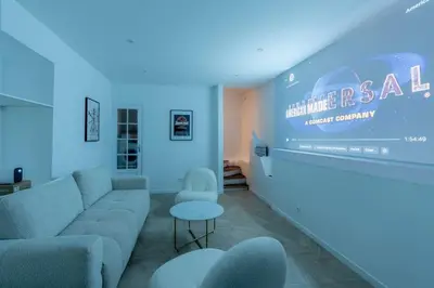 Coin salon dans l'établissement NEW - Appartement Luxeux avec Cinema et Sauna