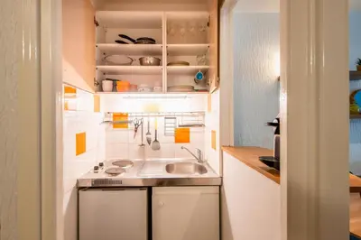 Cuisine ou kitchenette dans l'établissement Amazing studio on the most prestigious street