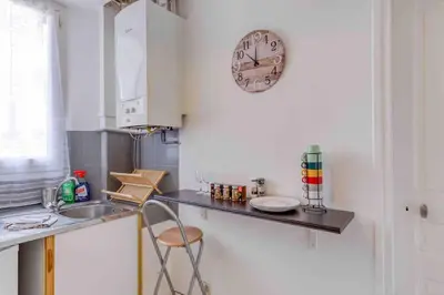Cuisine ou kitchenette dans l'établissement Appartement cosy au calme, proche de Paris et du RER B