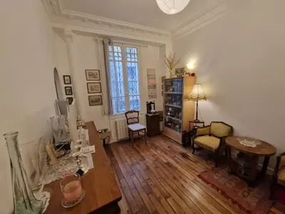 Coin salon dans l'établissement Appartement 2 pièces à Auteuil