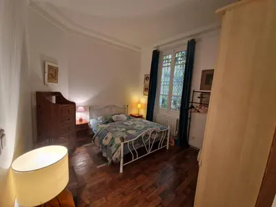 Un ou plusieurs lits dans un hébergement de l'établissement Appartement 2 pièces à Auteuil